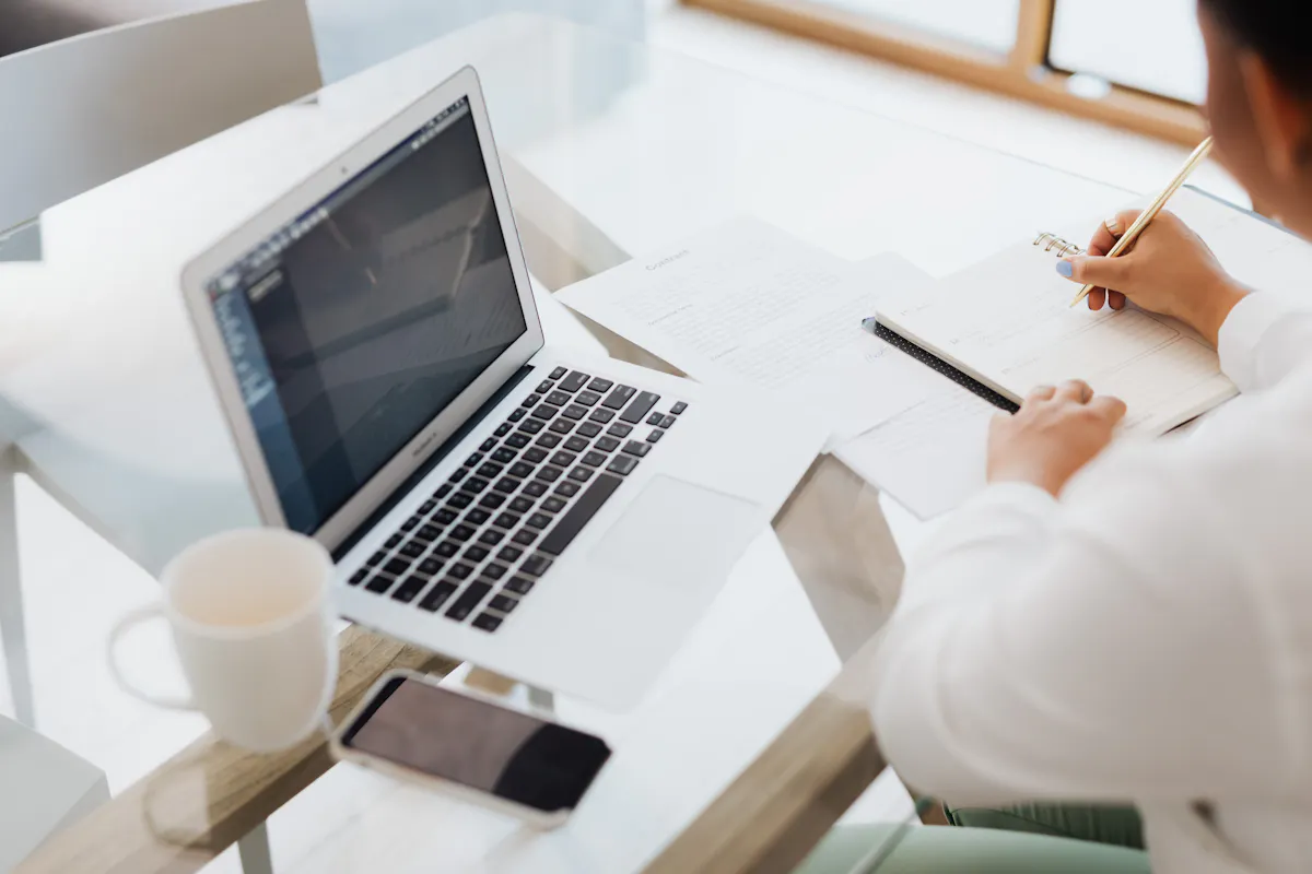 AI generating a personalized cover letter for a job application on a laptop