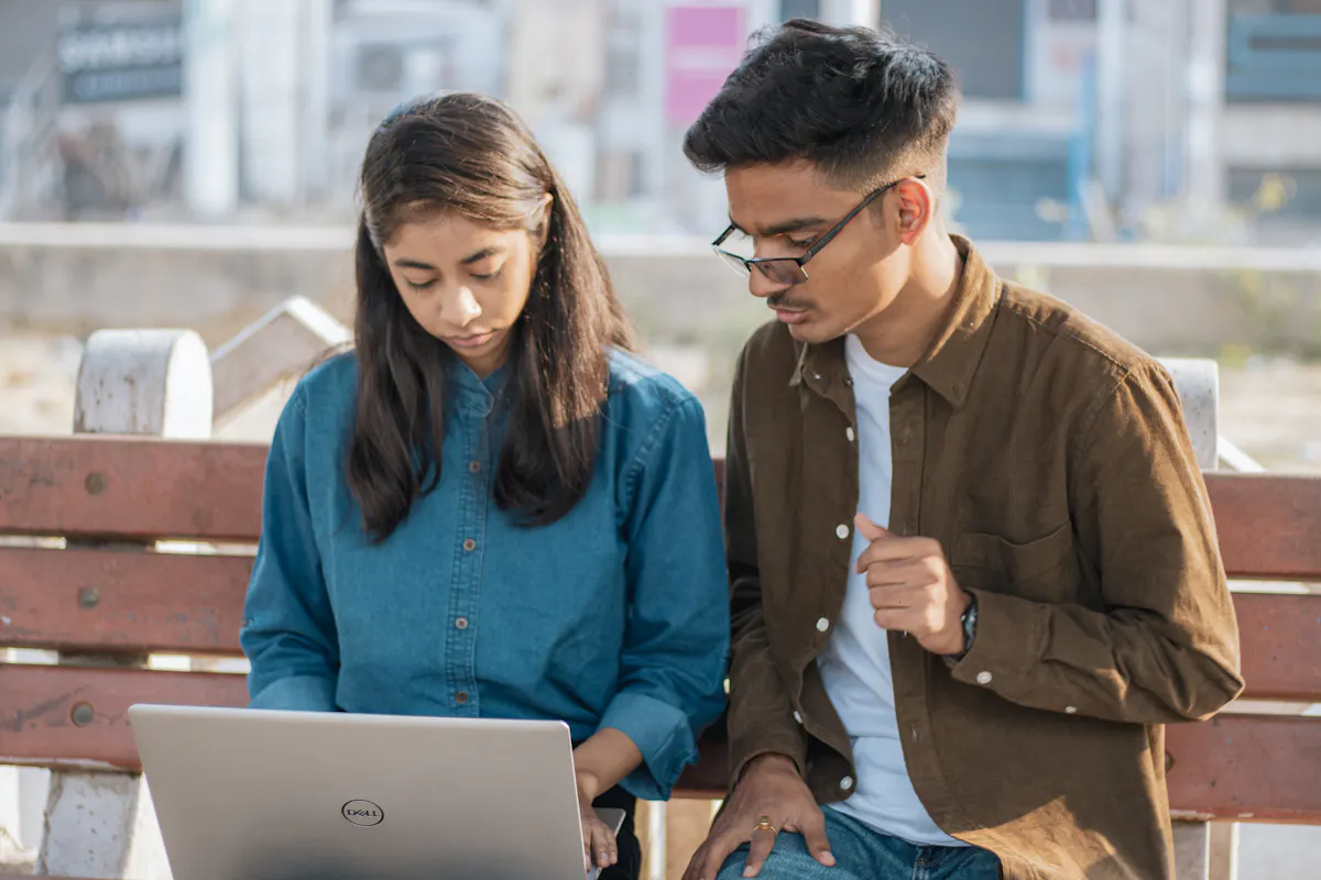 Fresher in India auto applying to Naukri and LinkedIn jobs on a laptop