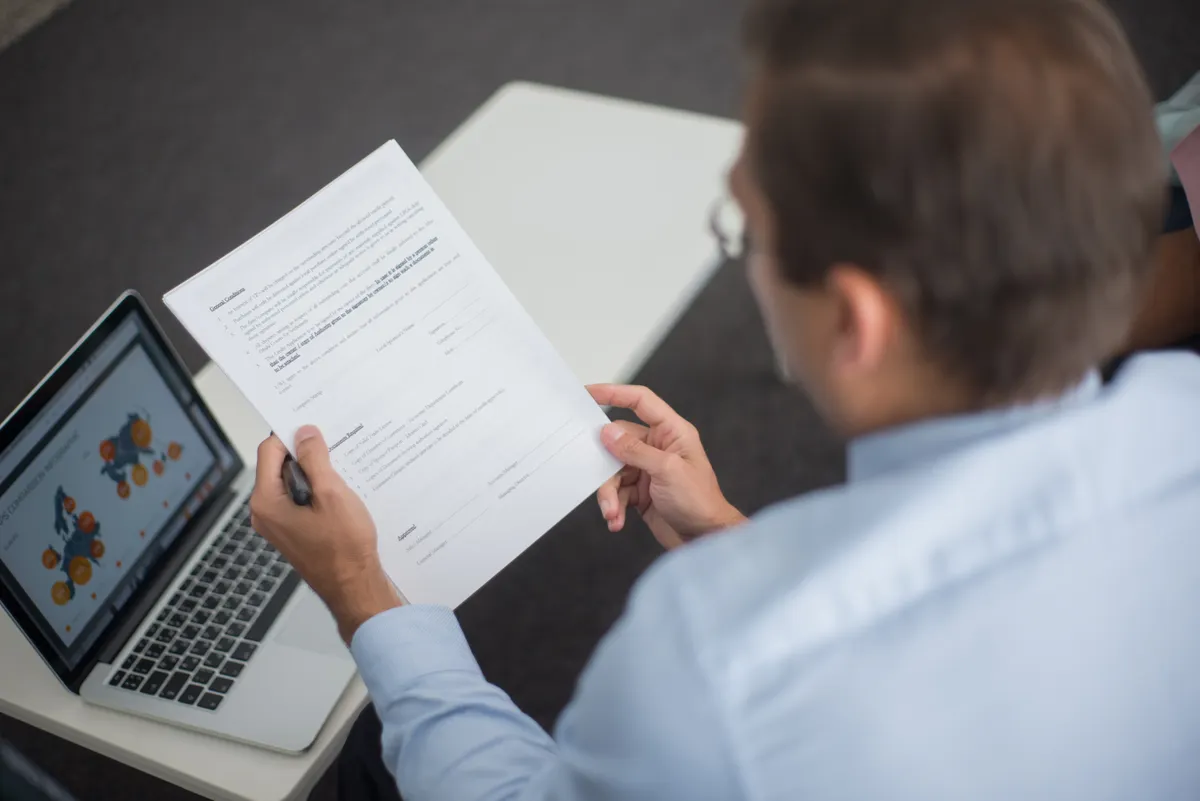 Reviewing a Naukri profile and resume score on a laptop